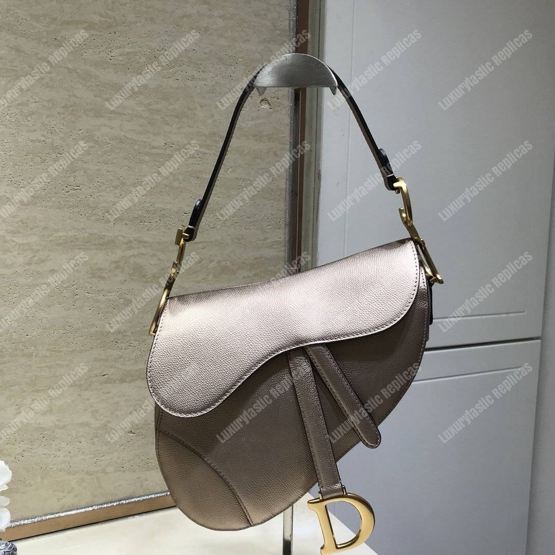 D*or saddle bag in champagne metallic grained calfskin