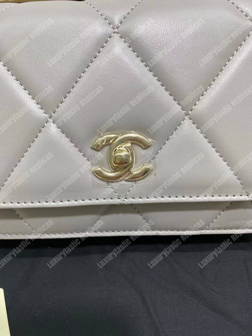 Ch*el wallet on chain – woc lambskin gold-toned metal white