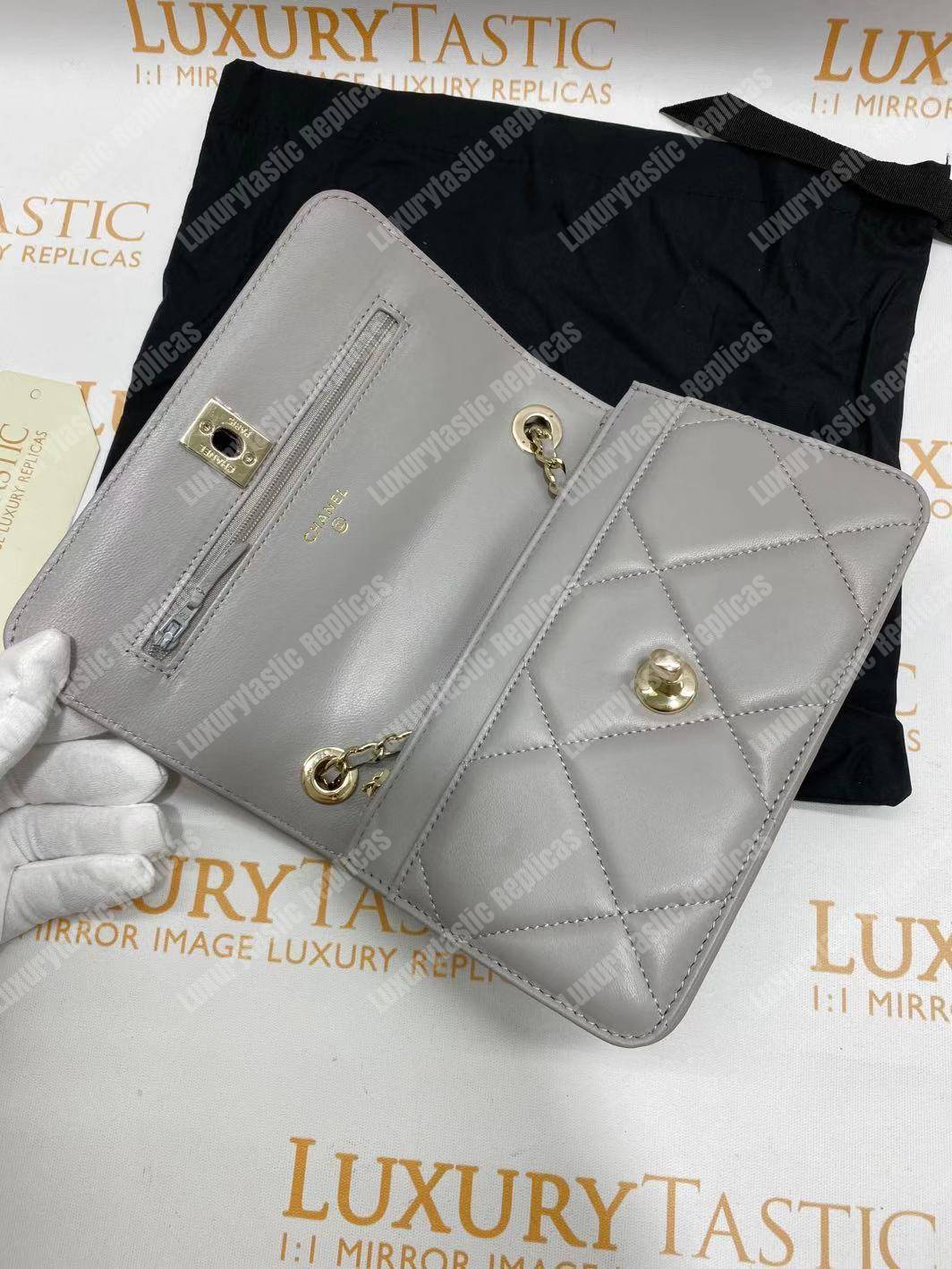 Ch*el wallet on chain – woc lambskin gold-toned metal white