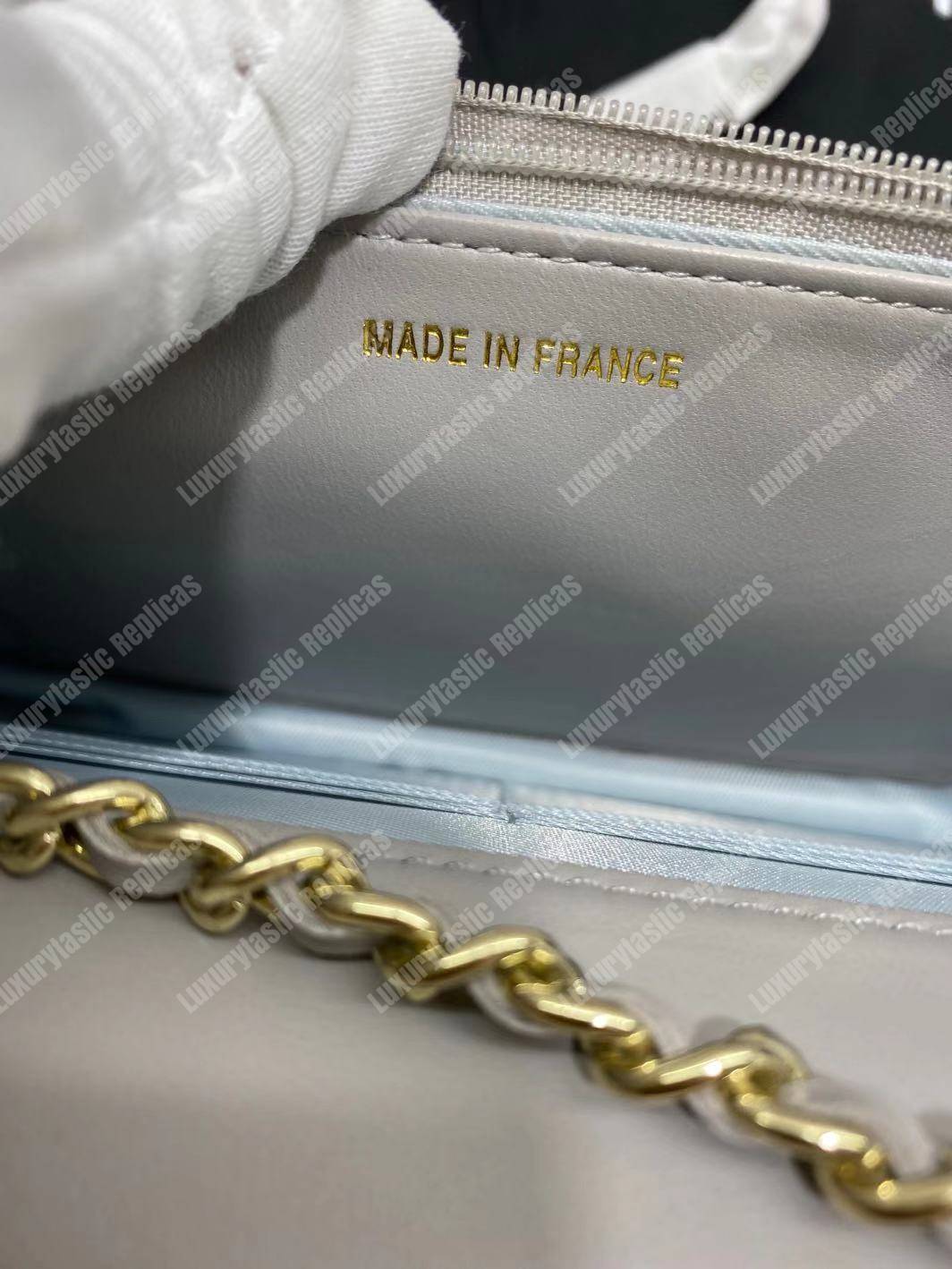 Ch*el wallet on chain – woc lambskin gold-toned metal white