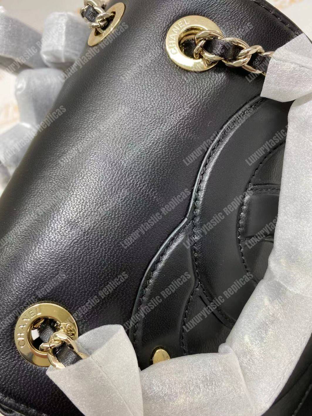 Ch*el lambskin gold-tone metal backpack black