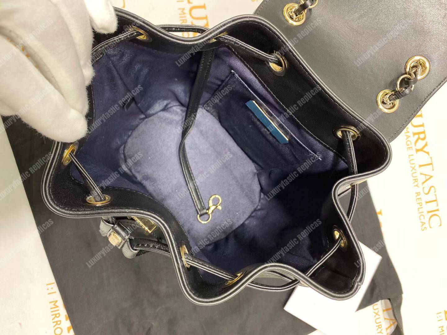 Ch*el lambskin gold-tone metal backpack black