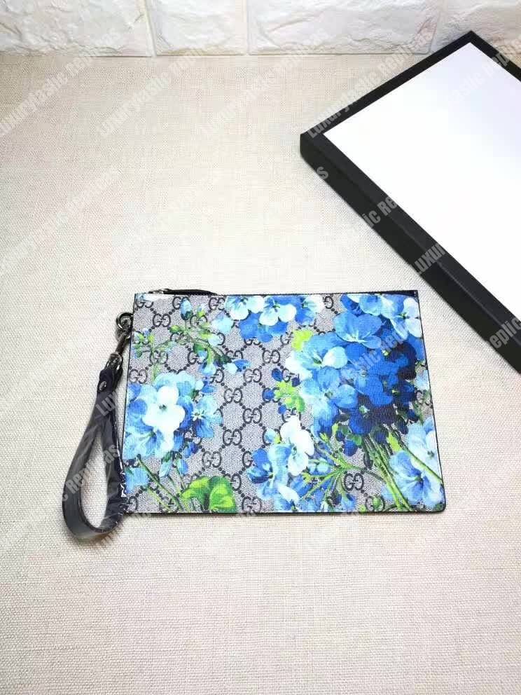 G*u*i blooms print gg sup*e clutch pouch