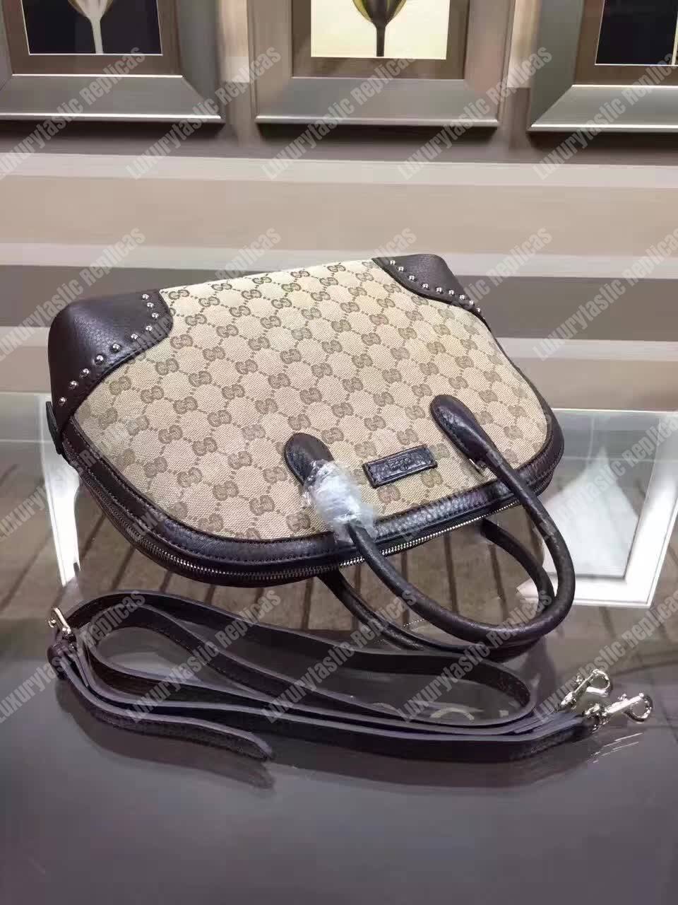 G*u*i gg canvas top handle bag black