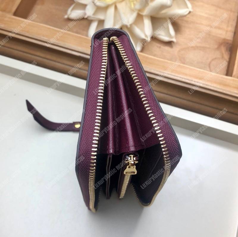 LV Clémence Wallet Monogram Empreinte Leather Raisin
