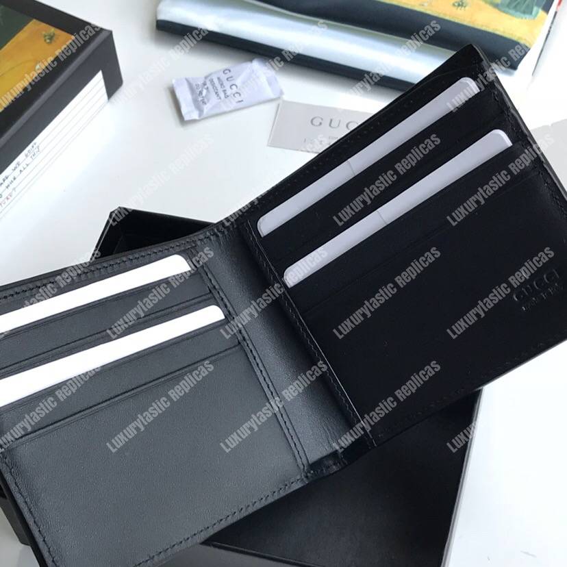 G*u*i leather wallet with G*u*i logo