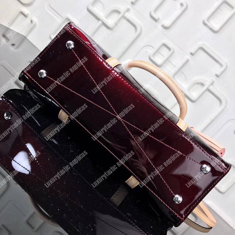 LV Neo Triangle Vernis Leather Amarante