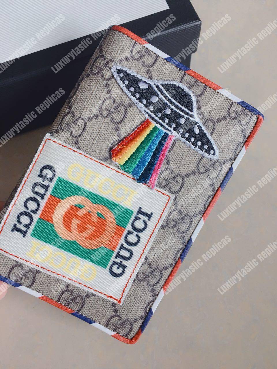 G*u*i courrier gg sup*e passport case beige ebony
