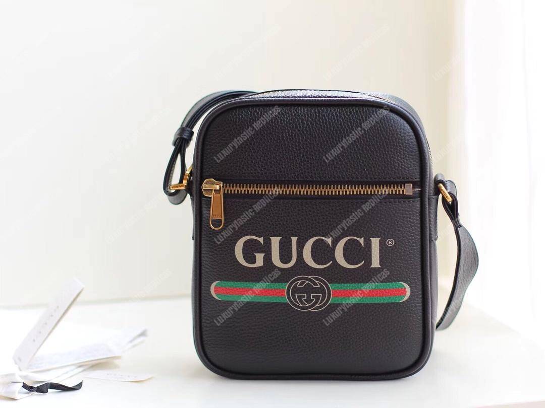 G*u*i print messenger bag black leather