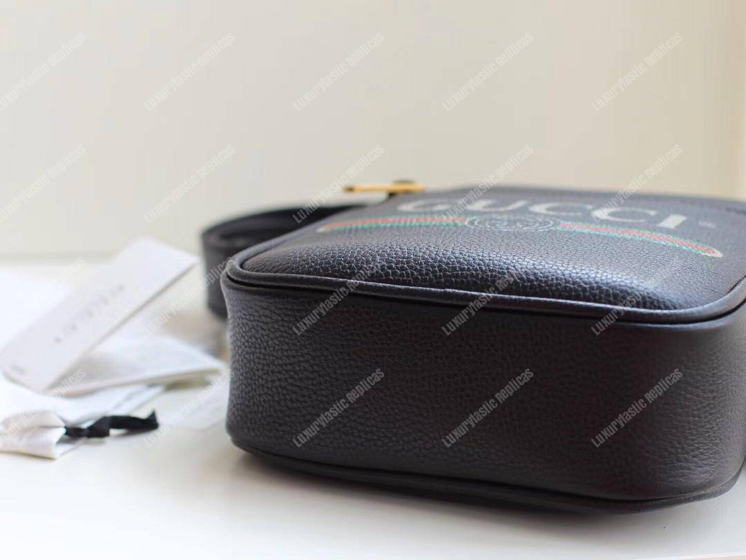 G*u*i print messenger bag black leather