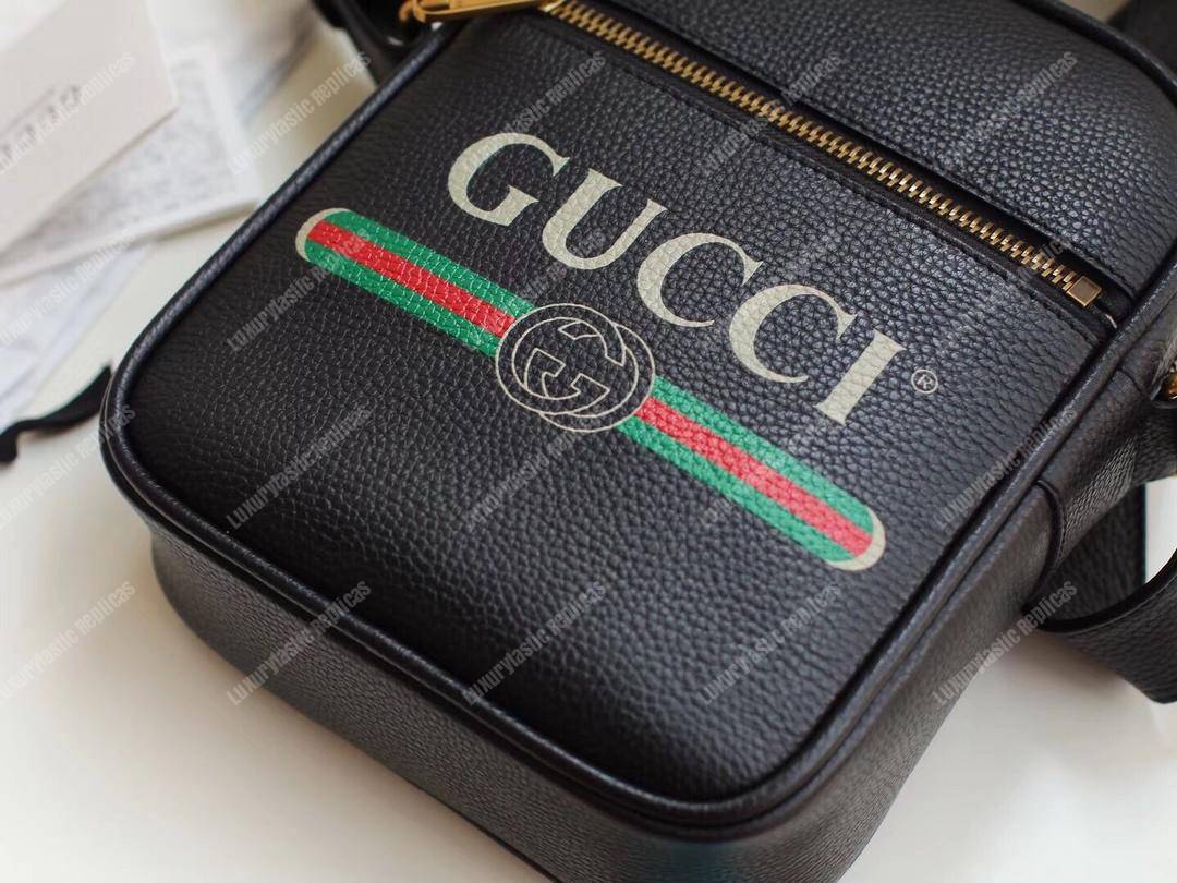 G*u*i print messenger bag black leather