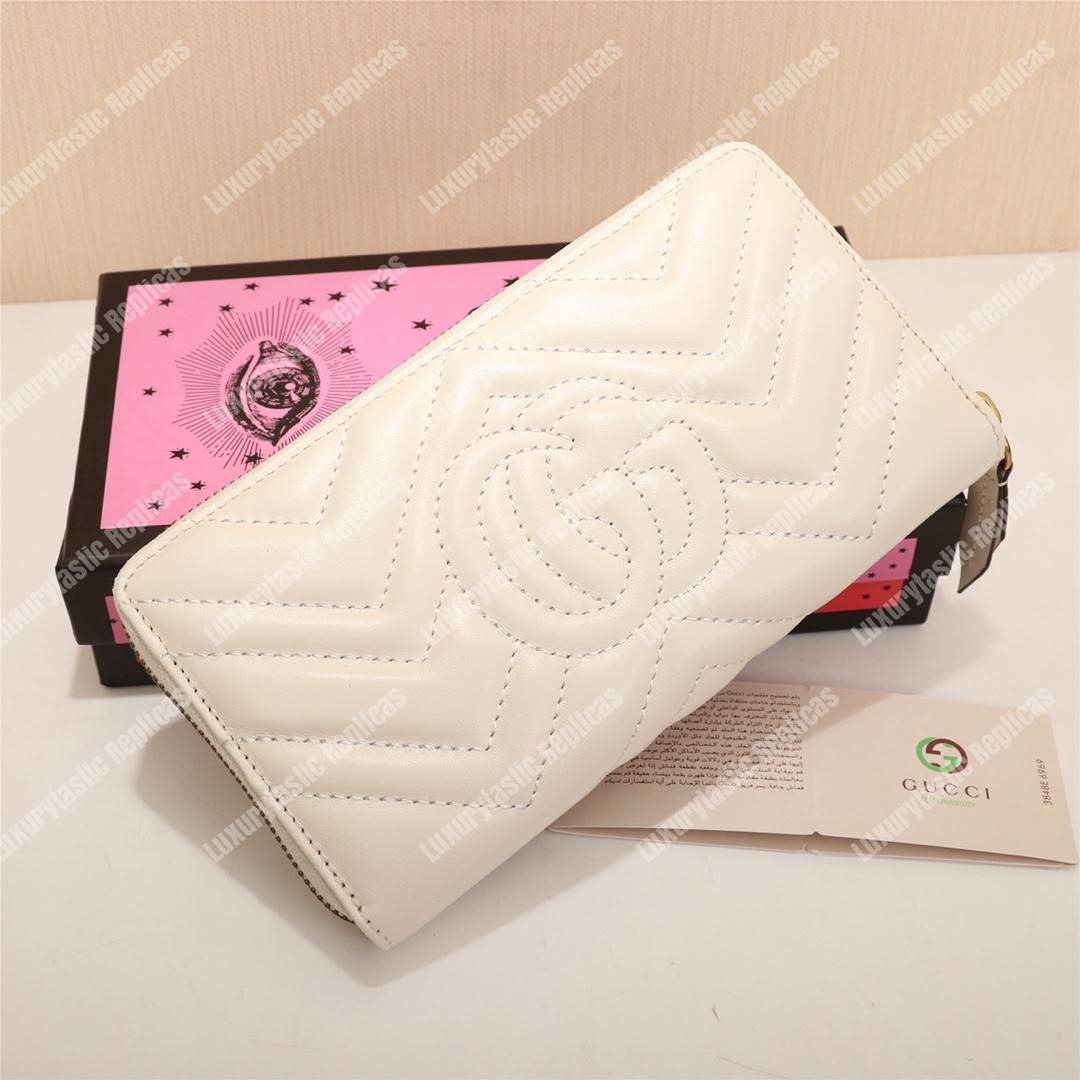 G*u*i gg marmont zip around wallet with animal studs white