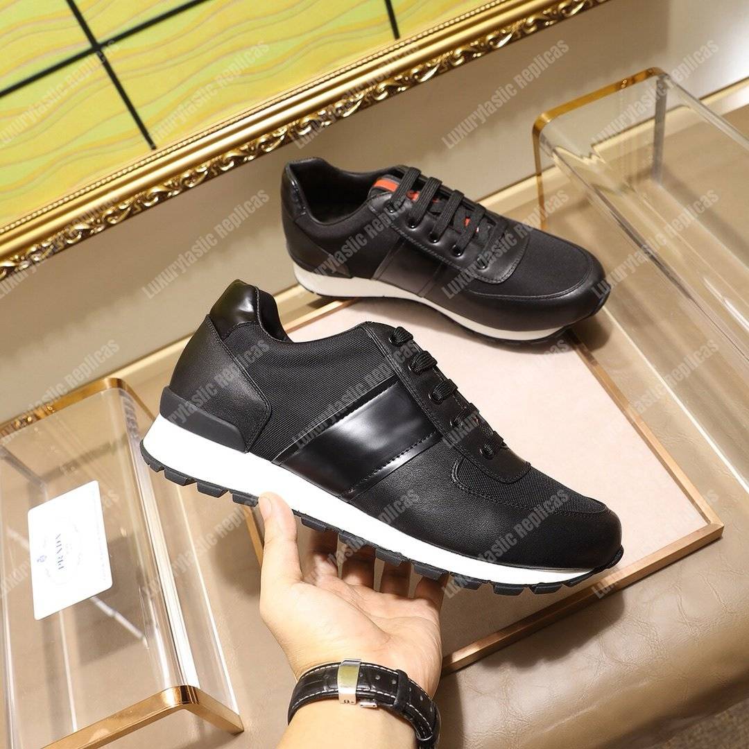 Pra*a fabric and leather sneakers black