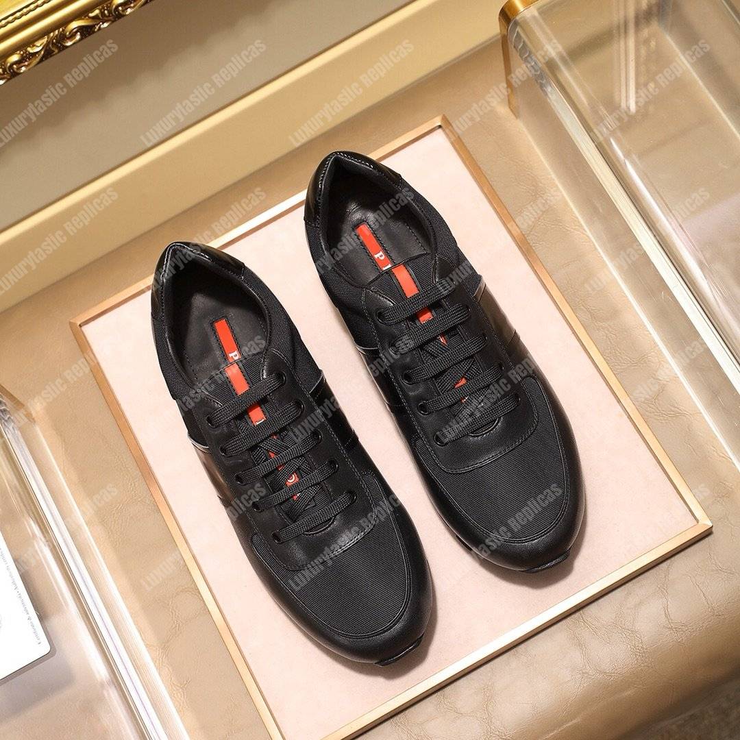 Pra*a fabric and leather sneakers black