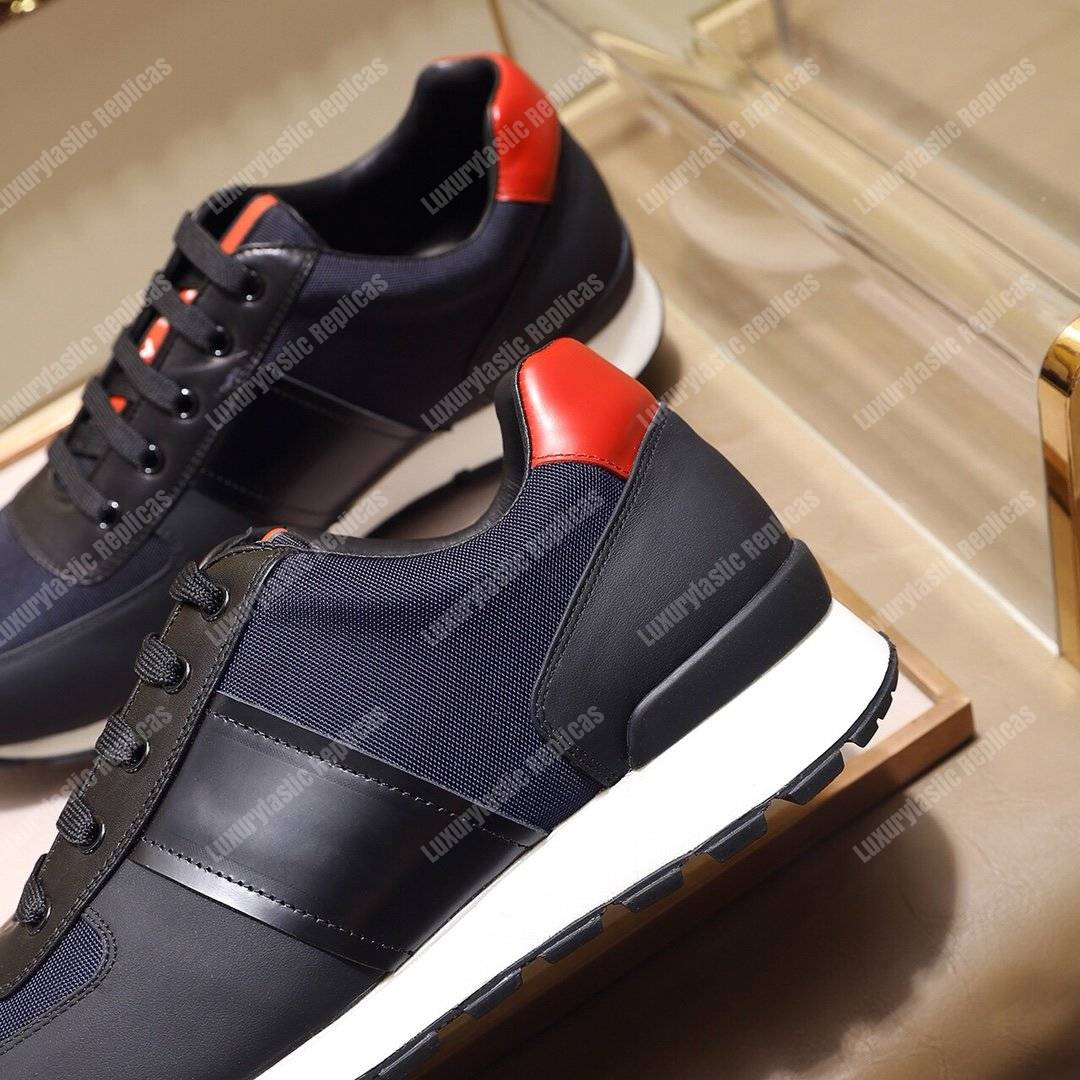 Pra*a fabric and leather sneakers blue/black/orange
