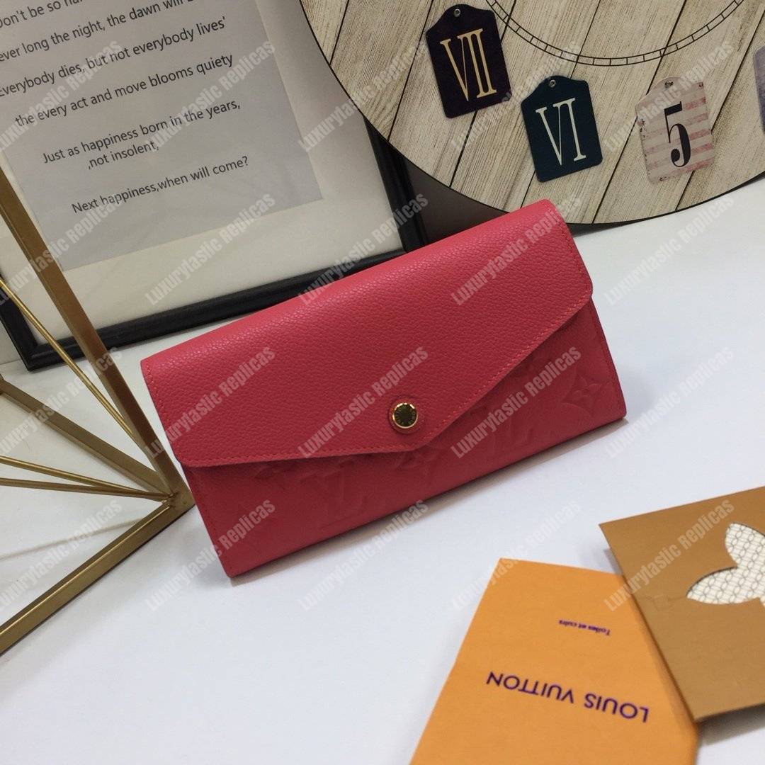 LV Sarah Wallet Monogram Empreinte Leather Scarlet