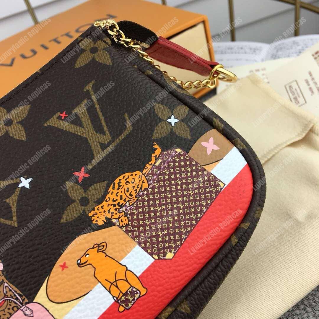 LV Mini Pochette Accessoires Lion and Cheetah