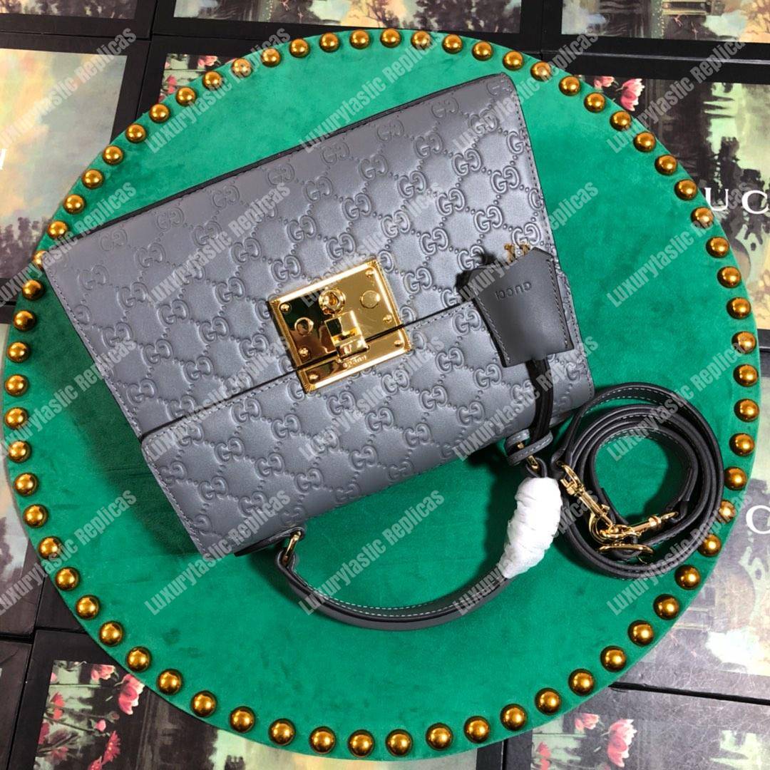 G*u*i padlock small signature top handle bag gray
