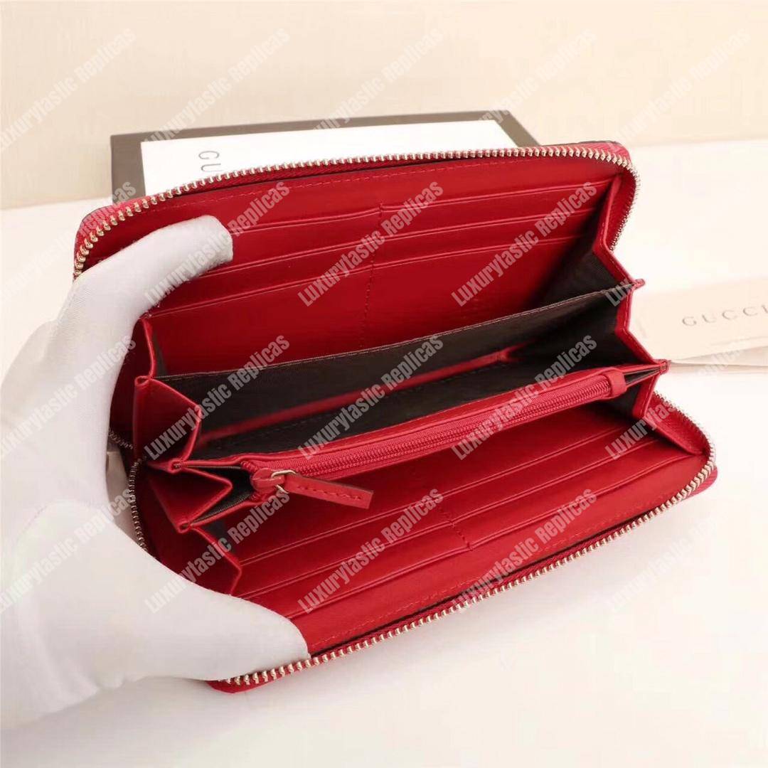 G*u*i icon G*u*i signature zip around wallet hibiscus red