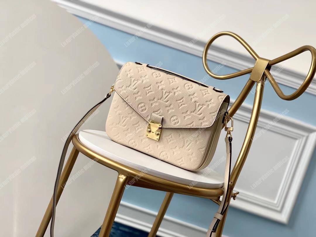 LV Pochette Metis Monogram Empreinte Leather Creme