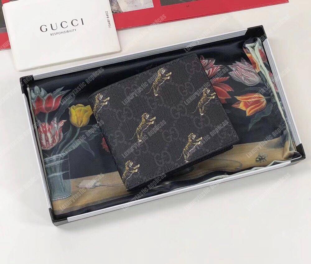 G*u*i gg wallet with tiger print