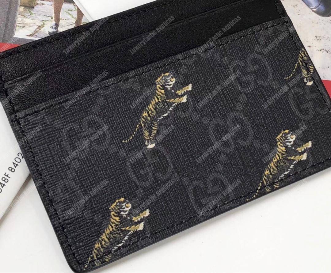G*u*i gg card case with tiger print