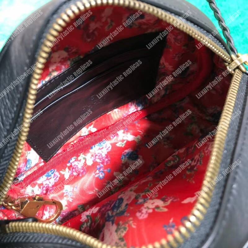 G*u*i leather mini bag black