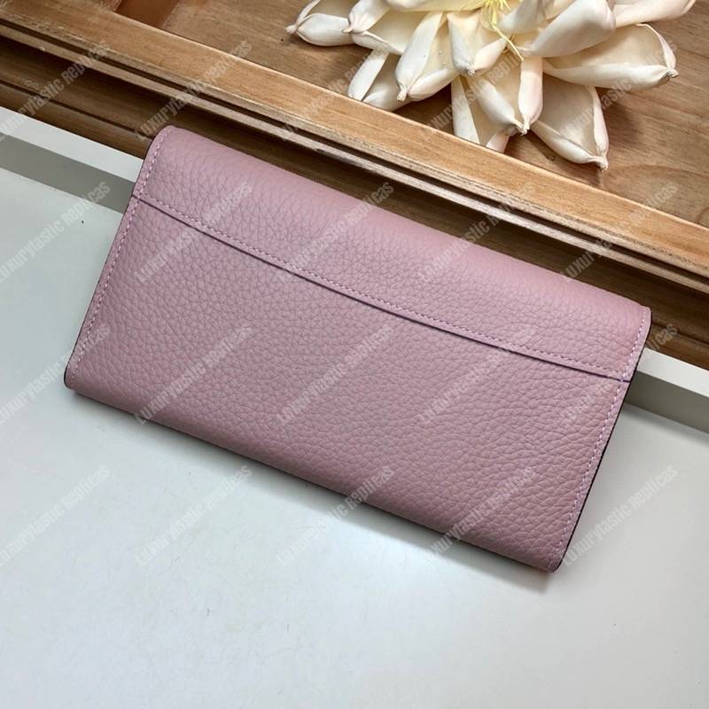 LV Capucines Wallet Taurillon Magnolia