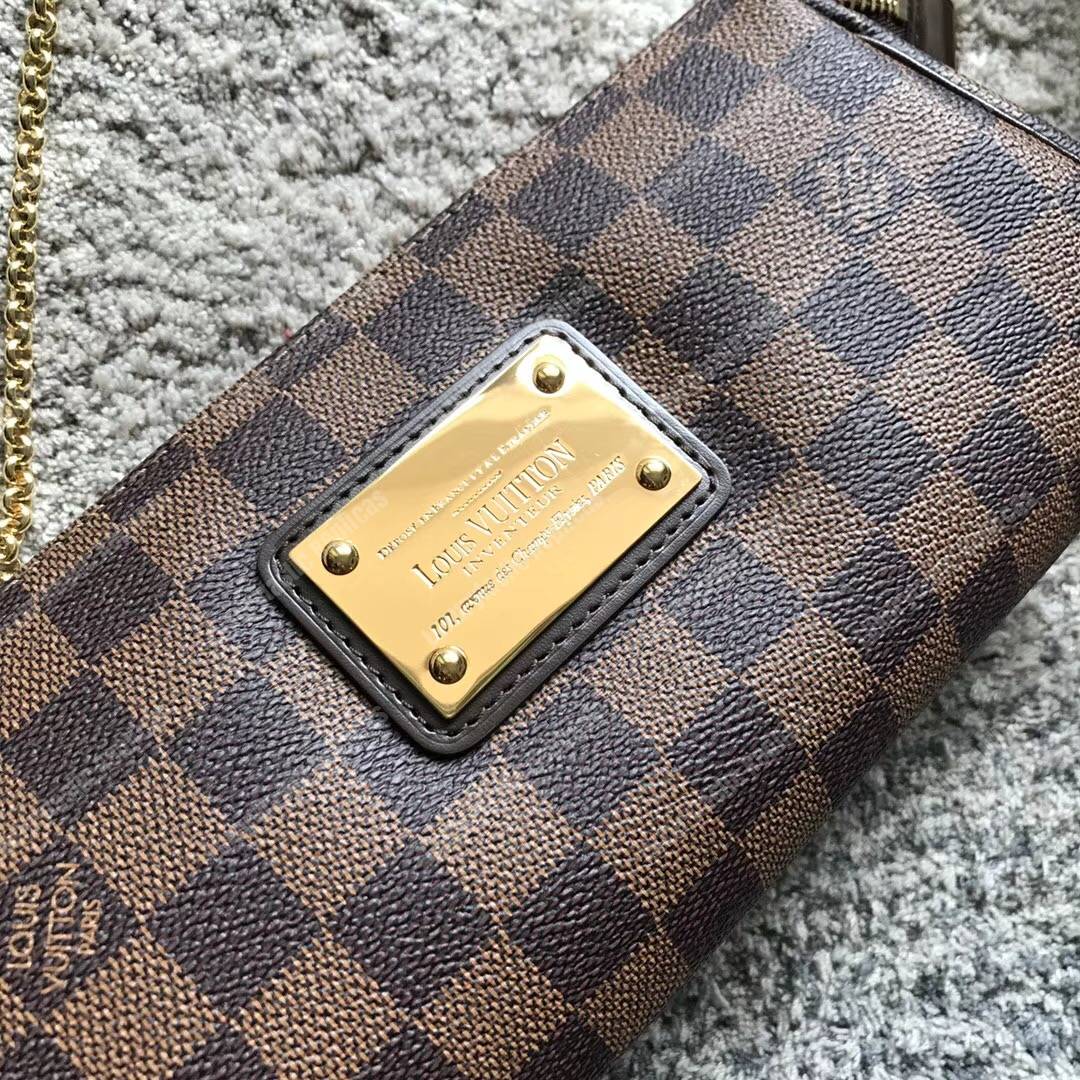 LV Eva Clutch Damier Ebene Canvas