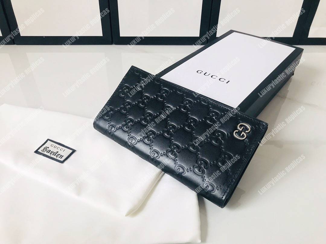 G*u*i signature long wallet with metal gg