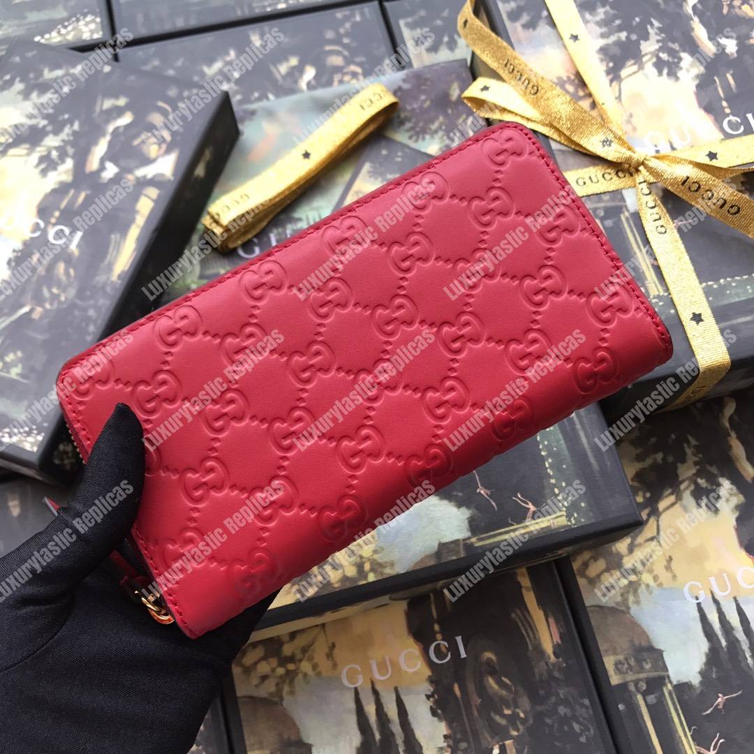 G*u*i signature zip around leather wallet red