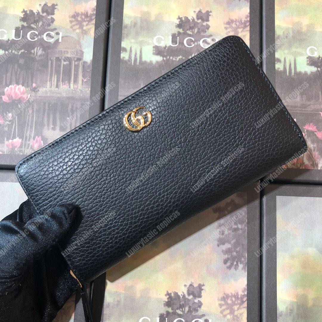 G*u*i leather zip around wallet black