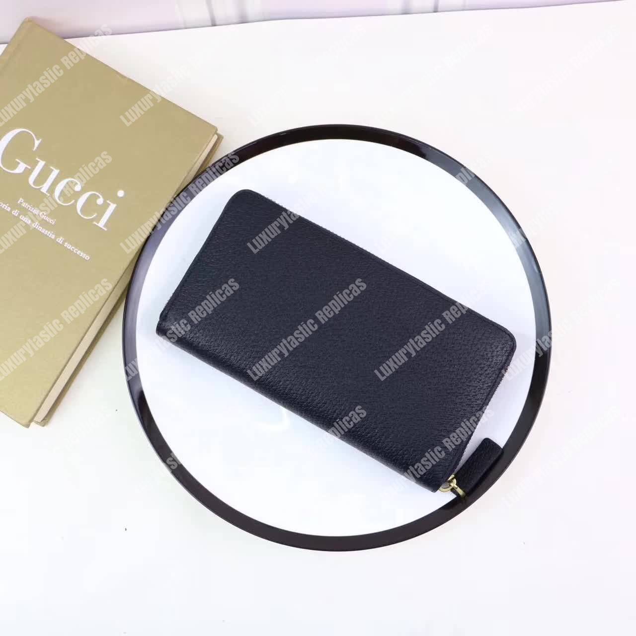 G*u*i leather zip around wallet with web black