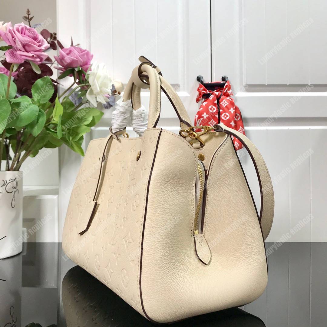 LV Montaigne MM Monogram Empreinte Crème Handbag