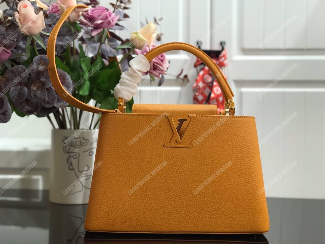 LV Capucines PM Taurillon Leather Ocre