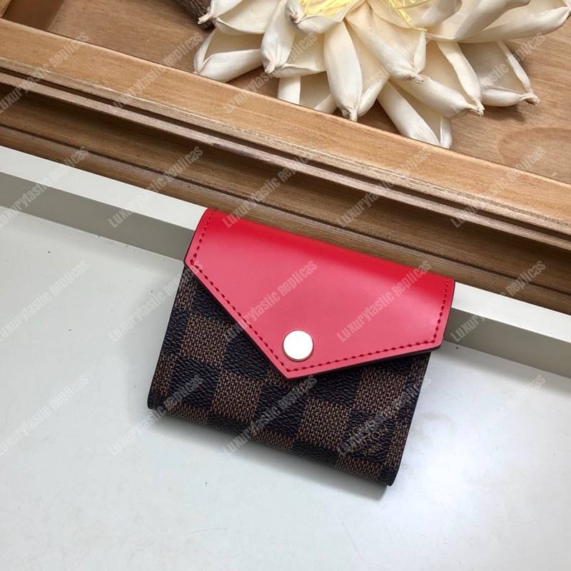 LV Zoé Wallet Damier Ebene Fuchsia colored leather