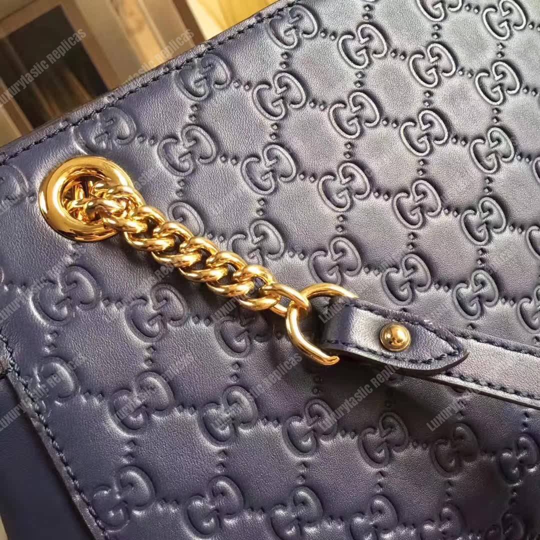 G*u*i signature medium top handle bag blue