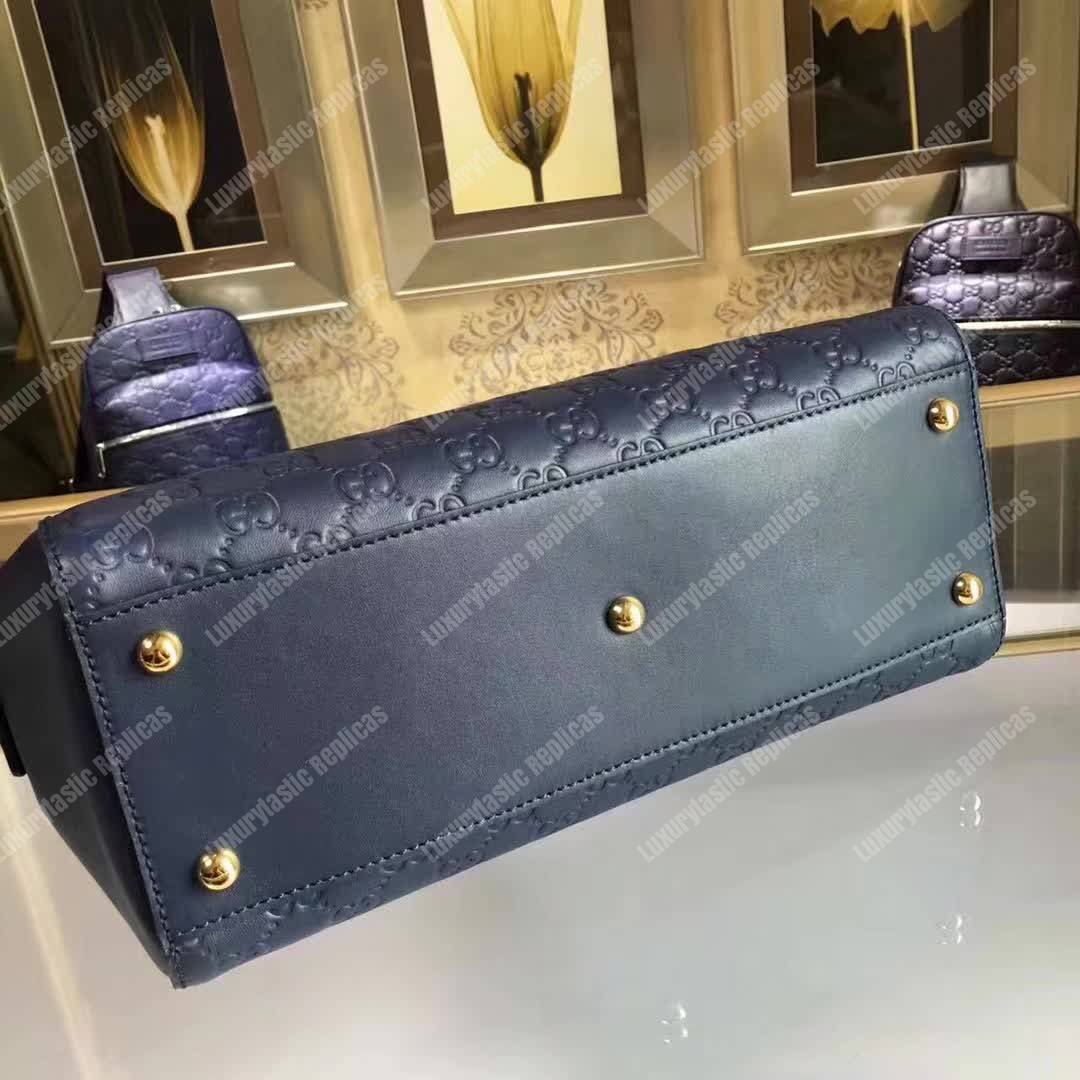 G*u*i signature medium top handle bag blue