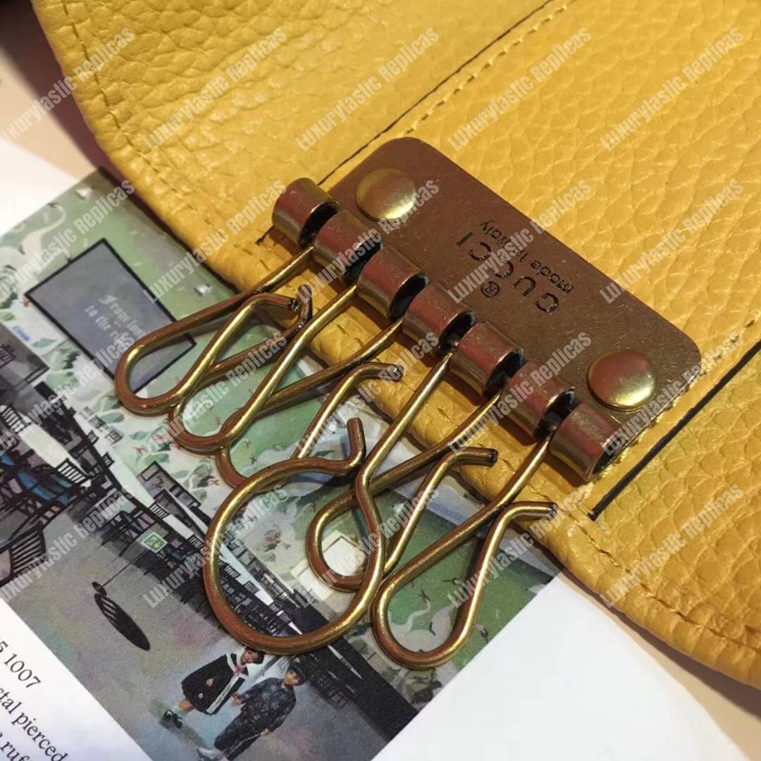 G*u*i garden leather key case yellow with bat