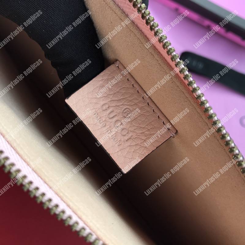 G*u*i leather pouch with butterfly pink