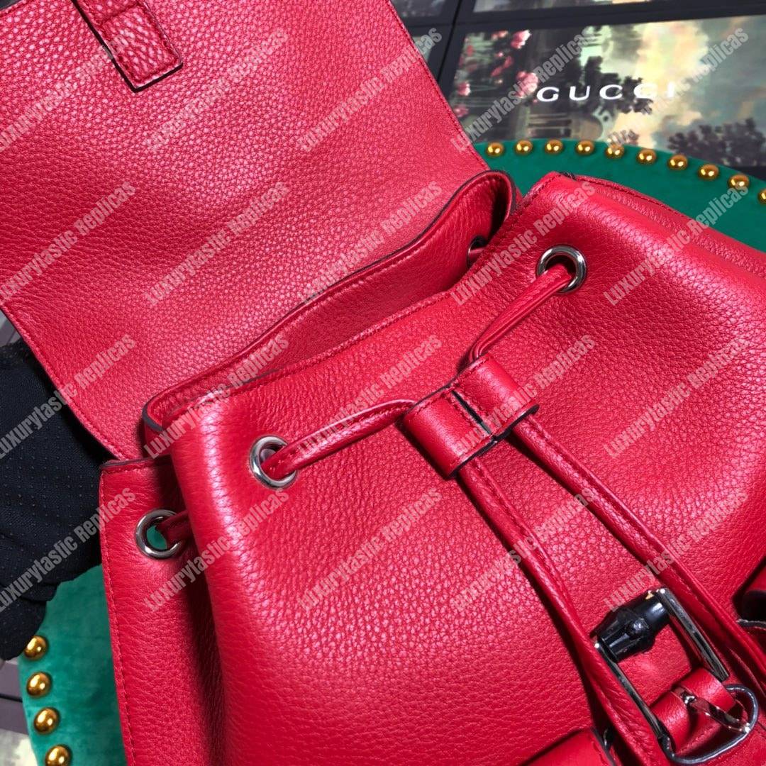 G*u*i leather bamboo tassel backpack hibiscus red