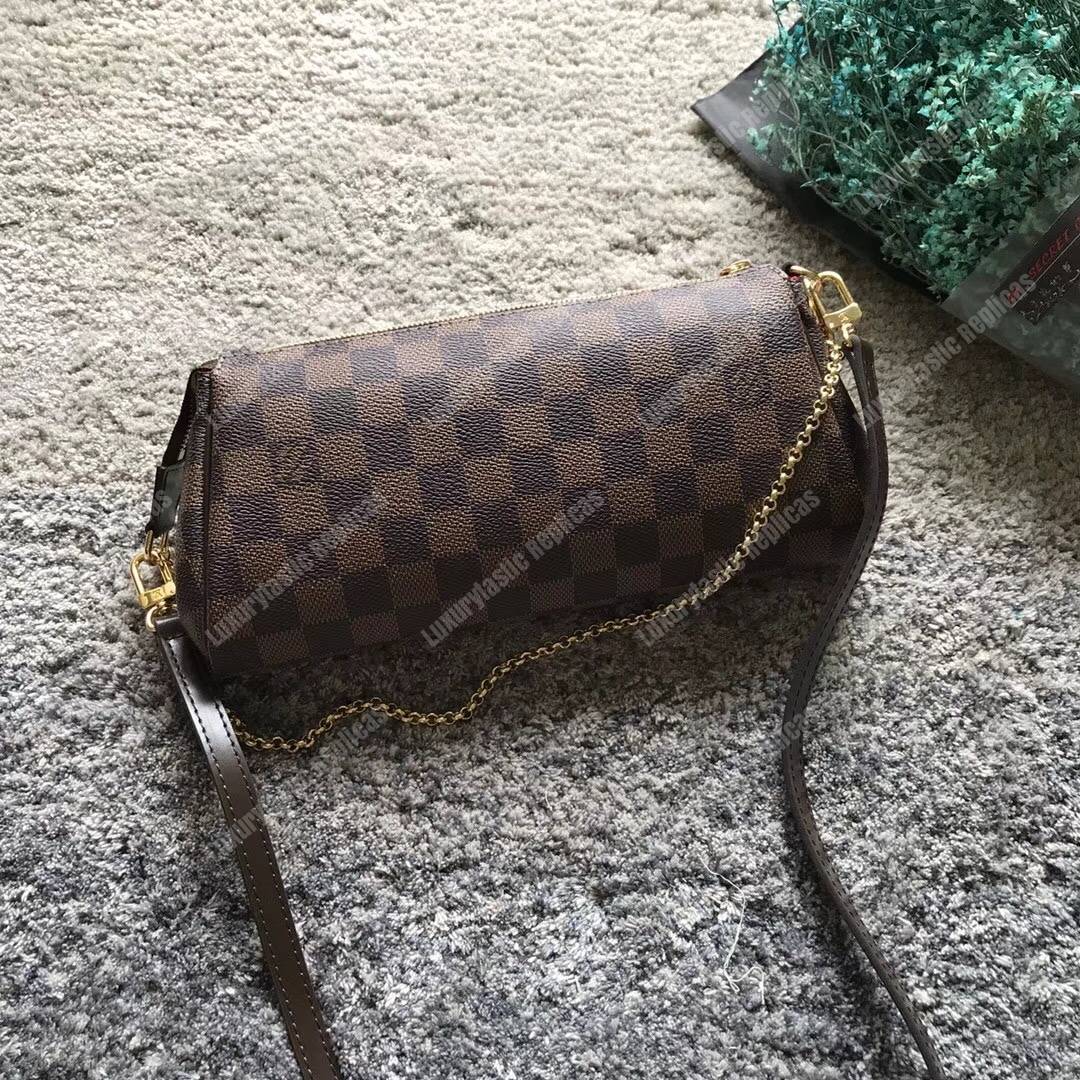 LV Eva Clutch Damier Ebene Canvas
