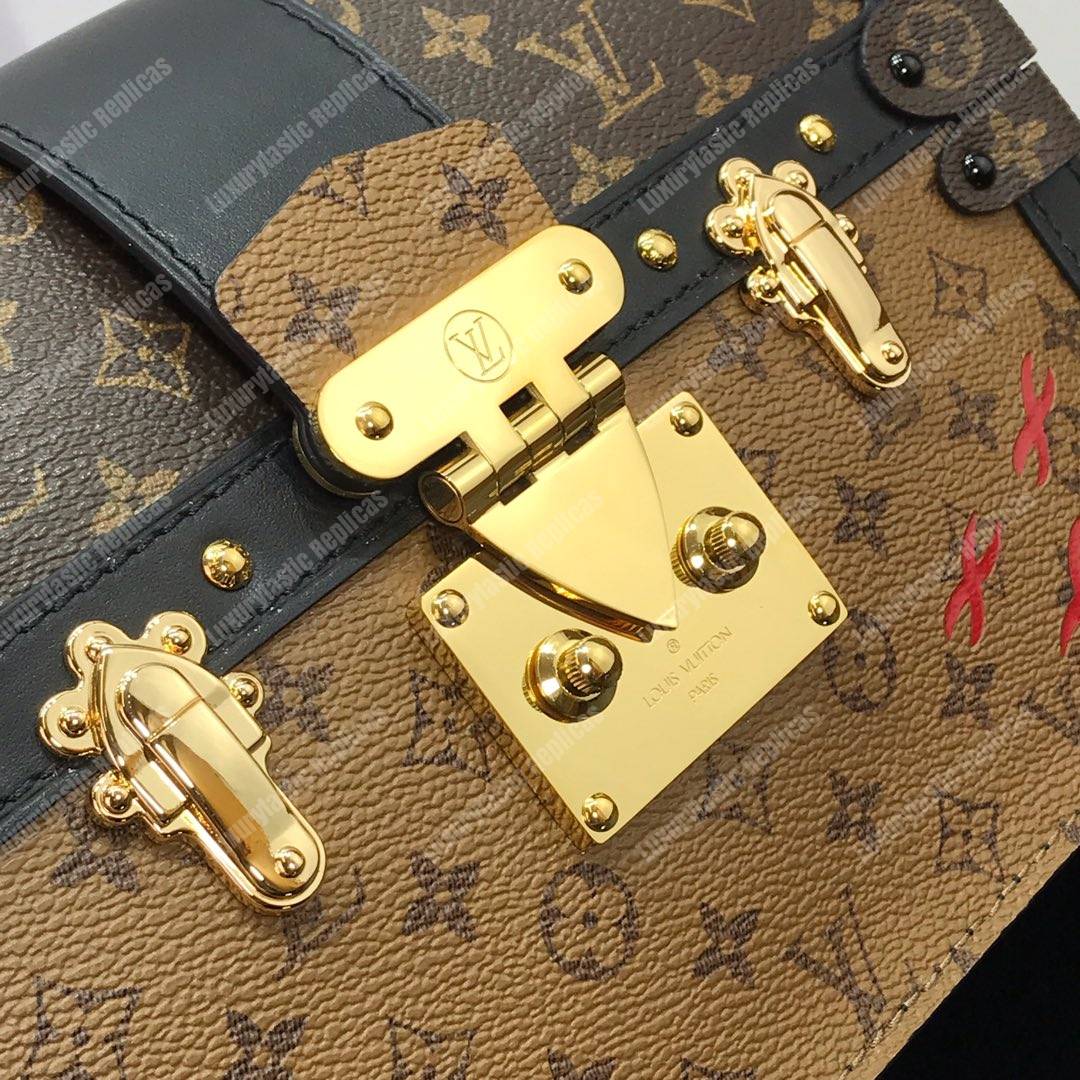 LV Trunk Clutch Monogram Reverse Canvas