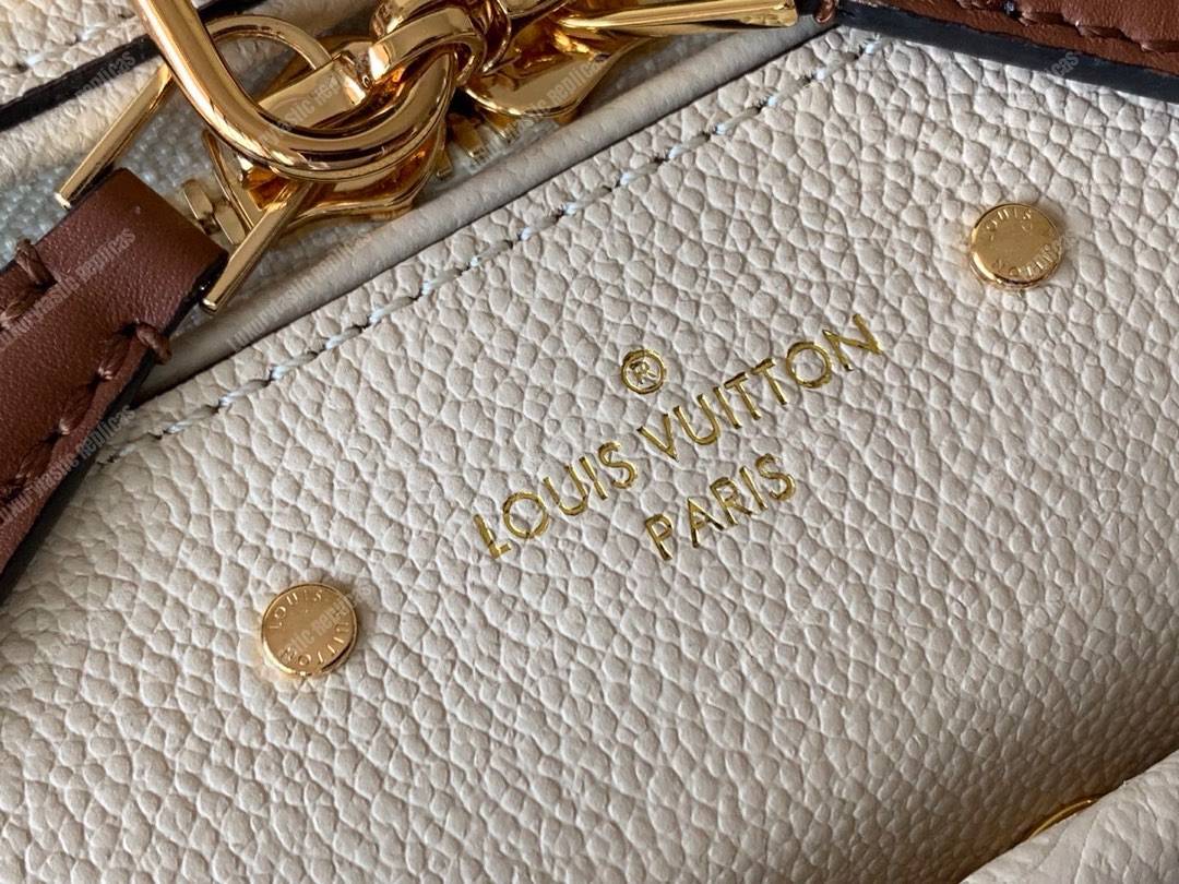 LV Speedy Bandouliere 25 Monogram Empreinte Leather Creme Caramel
