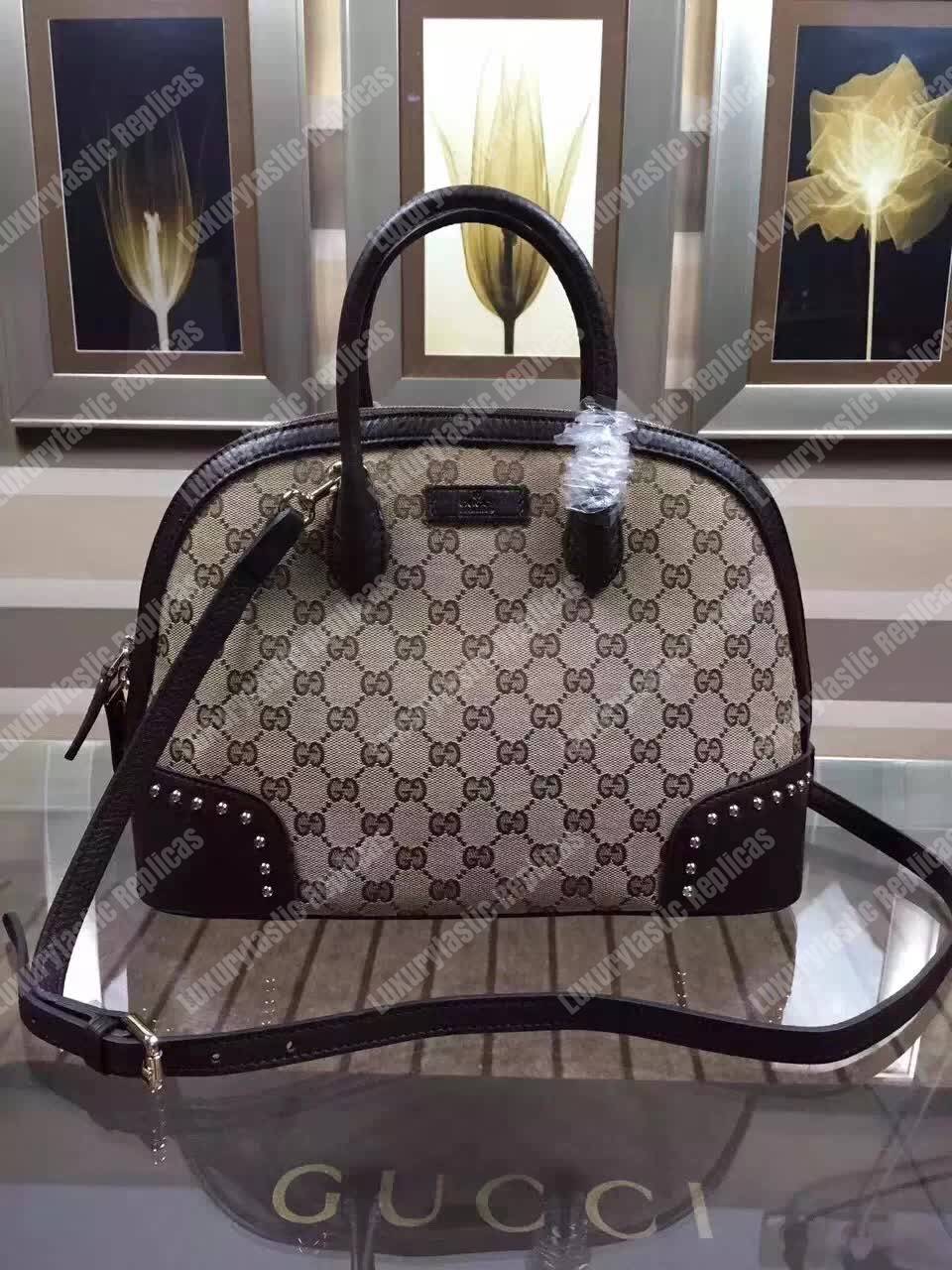 G*u*i gg canvas top handle bag black