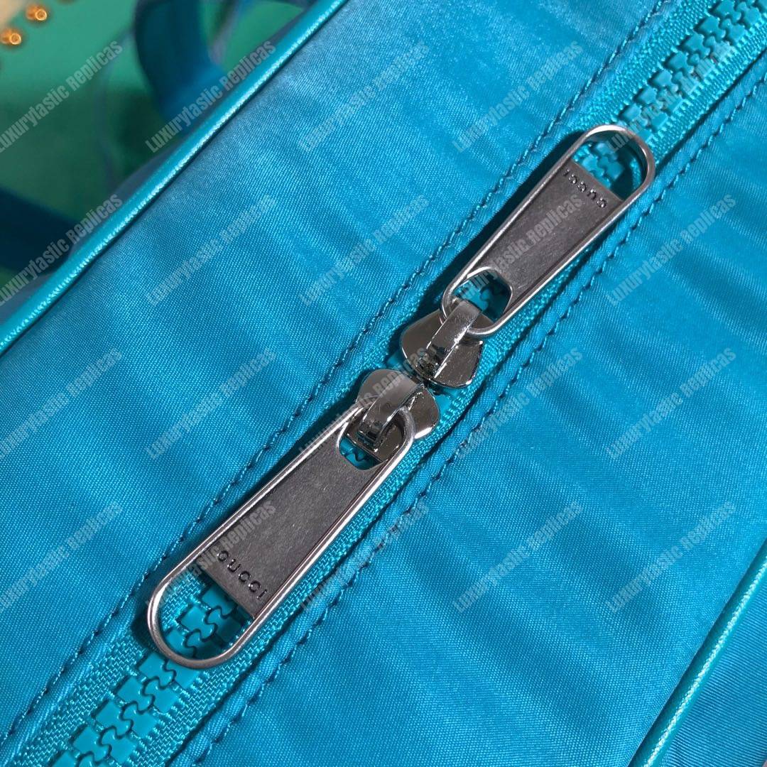 G*u*i medium backpack with G*u*i ’80s patch light blue