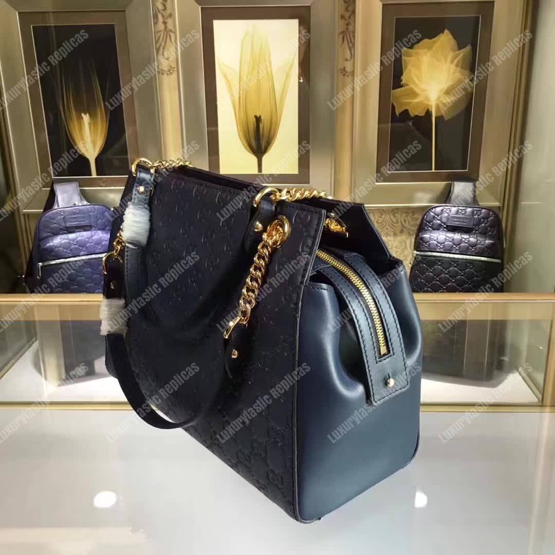 G*u*i signature medium top handle bag blue