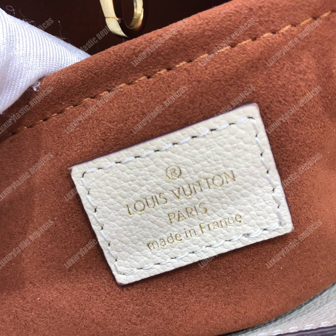 LV Montaigne MM Monogram Empreinte Crème Handbag