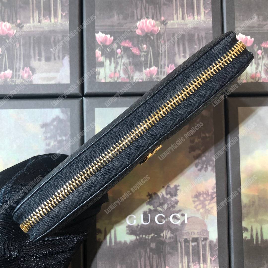 G*u*i leather zip around wallet black