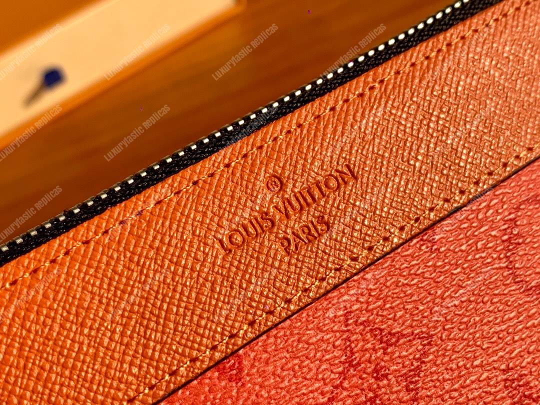 LV Discovery Pochette PM Orange